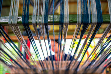 Cotton weaving from northeast Thailand. Thai indigo dye Cotton weaving in the traditional way,...