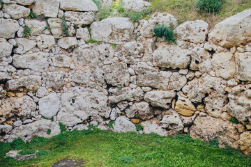 the oldest stone wall with moss