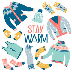 Stay warm. Vector set of cute winter clothes © Elena