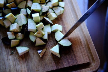 Chopped eggplant on a cutting board