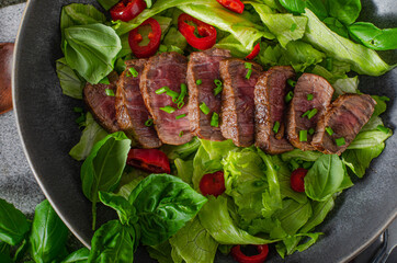 Delicious beef steak with salad