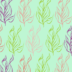 Colored leaves on mint background