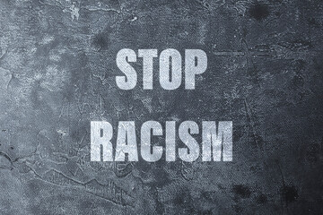dark background with the text Stop racism. concept of protests in the United States.