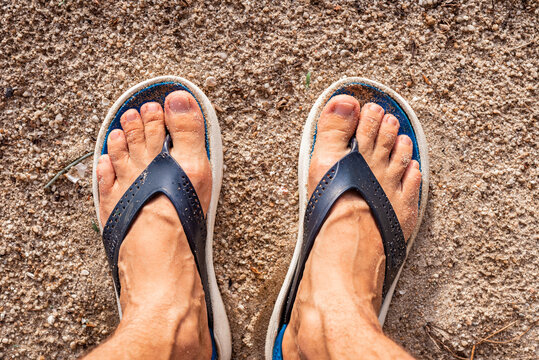 slippers on the beach, beach shoes on the stairs, access to the sea from the hotel, paradise island of Koh Samui in Thailand, shales on the sand, beach season in the tropics, vacation in Asia,