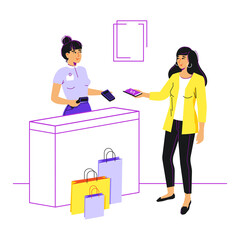 A cheerful young girl is paying at the checkout using an electronic wallet.