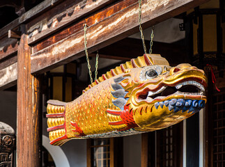 Wooden dragon-fish in traditional Chinese temple