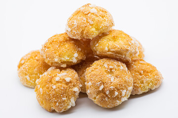 Sweet little bread with sugar on white background