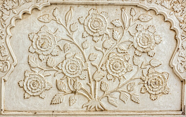 Fototapeta na wymiar Artwork on marble at the Bibi ka Maqbara, built by Azam Shah in 1678, as a son's tribute to his mother, Begum Rabia Durrani, the Queen of Mughal emperor Aurangzeb. Aurangabad, Maharashtra, India
