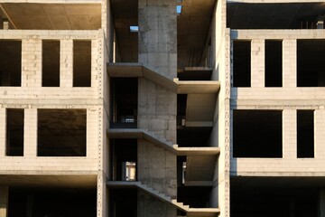 Construction of a new unfinished residential building. View of the stairs structure.