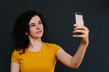 Portrait of funny emotional girl on grey background. Surprise. Upset. Joy. Fright