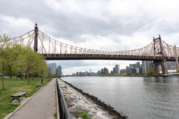 Queensbridge Park along the East River with the Queensboro Bridge in Long Island City Queens New York