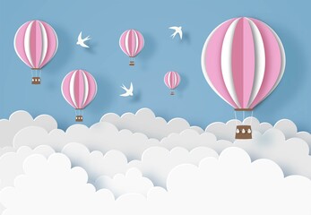Pink hot air balloons with white clouds, birds and blue sky. Paper cut out digital craft style. Carving art. Vector illustration