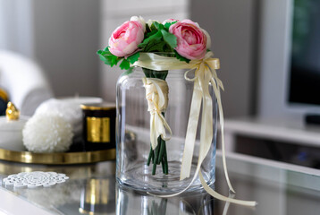 Trendy white home deccoration - 
candles, flowers 