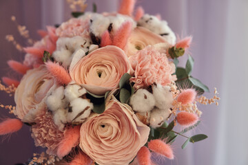 Pink bridal bouquet. Peonies, cotton, composition of flowers. High quality photo