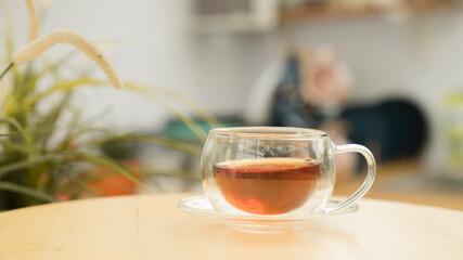 a cup of tea with teapot