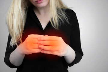 Woman suffers from pain in fingers. Arthritis or arthrosis, cartilage wear, rheumatism of the...