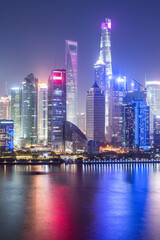 modern financial buildings at night in shanghai