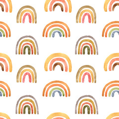 Childish cute seamless pattern with watercolor pastel pink, terracotta, burnt orange and yellow naive rainbows on white background. Hand painted illustration in scandinavian style. Boho arch print