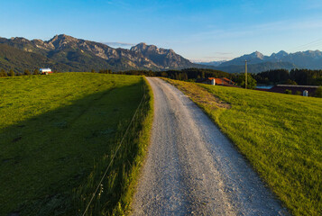 Fototapeta na wymiar Typical landscape of Bavaria - the German Alps at Allgau