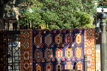 National carpets with Caucasian patterns are for sale in the old town