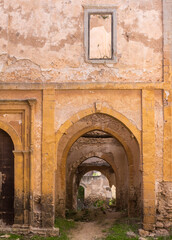 Gate in a yard of abandoned house, Morocco