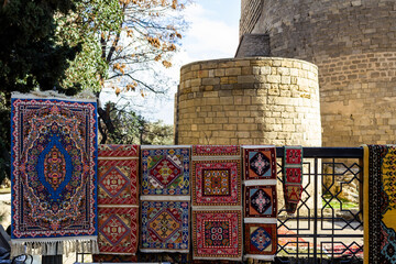 National carpets with Caucasian patterns are for sale in the old town