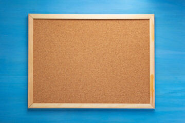 Fototapeta premium cork board on wooden background