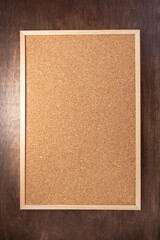 Fototapeta premium cork board on wooden background