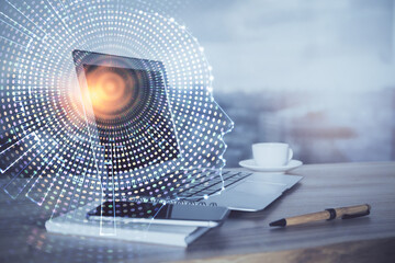 Multi exposure of work table with computer and brain hologram. Brainstorm concept.