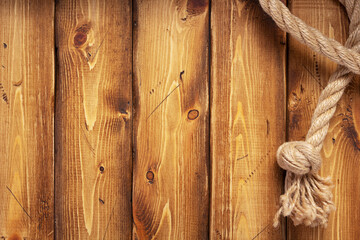 ship rope border at wooden background