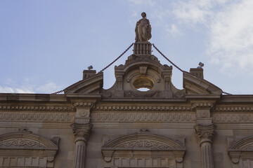 Small streets of the old city with national patterns and ornaments on the walls of buildings