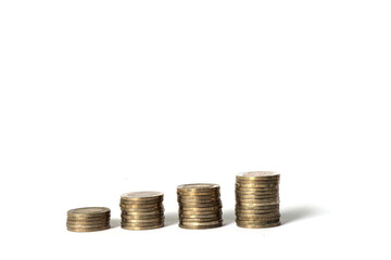 Stack of four stick coins, similar to the bar chart. On a separate isolated white background. There is a shadow of each stack of coins. Concepts of financial management.