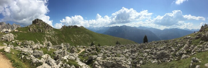 Panoramic landscape view of the mountainous, rocky Dolomites