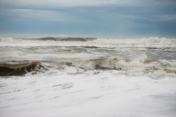 waves crashing on the beach