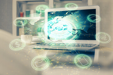 Computer on desktop with social network theme icon. Multi exposure. Concept of international...