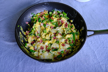 Frittata with asparagus, bacon and spring onions.