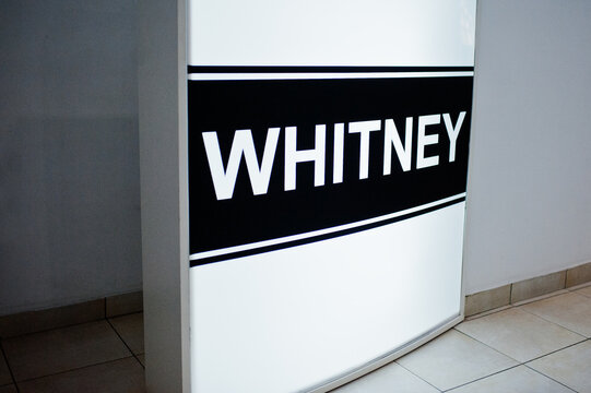 Hai, Ukraine - July 10, 2018: Big poster saying whitney on the wall in the shop.