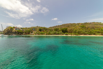 Wide angle view of  Princess Margaret bay with hills in the background, Bequia, Saint Vincent and the Grenadines