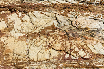 Detail, close up of sand stone background texture. Grey brown rich natural colours