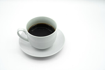 A cup of coffee placed on a white background