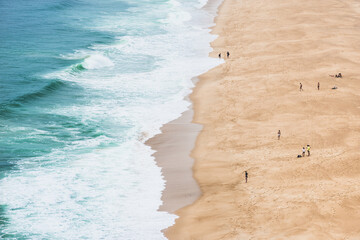 Panoramic view of ocean beach drone view. Beautiful long ocean beach. Portugal.