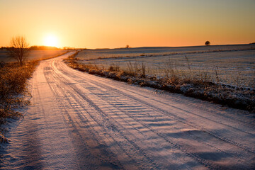Winter, snow on the road, sunset, orange
