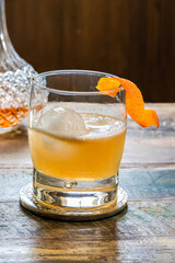 Whiskey sour cocktail with ice cubes