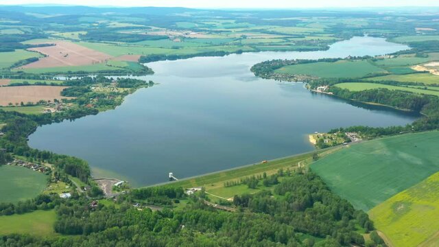 The Jesenice Reservoir on Odrava River is dam in Cheb. Aerial view to important source of sustainable energy in Czech Republic.