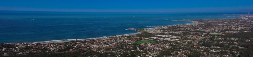 Fototapeta na wymiar Panoramic view of Wollongong Sydney Australia from Bulli Lookout on a sunny winters day blue skies 
