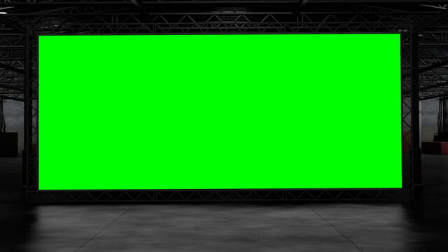 3d rendering of dark empty factory interior or empty warehouse, a green screen backdrop in the middle