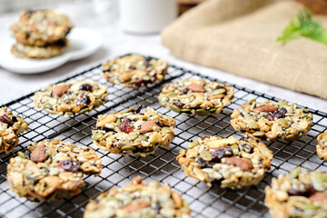 Mixed Nut and Dried fruits and Seeds Florentine, Gluten free whole foods Healthy biscuit cookies. set on cafe table.