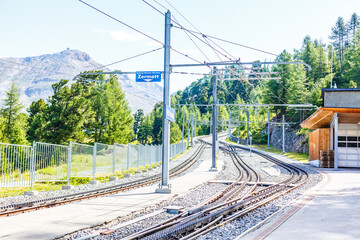 Swiss mountain train crossed Alps, railway in the mountains