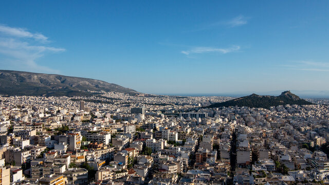 Athens city with Lecabettus hill and Ymittos Mountain