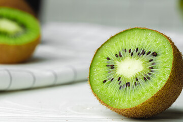Cut kiwi half slice close up photo
